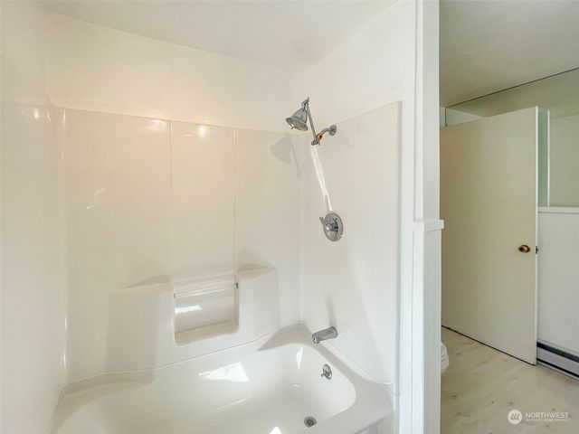 a bathroom with a bathtub