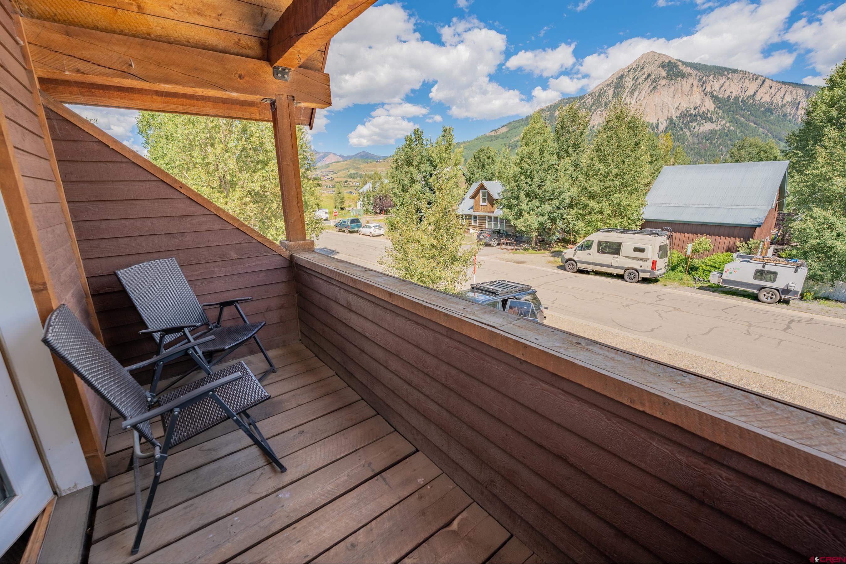13 7th Street Crested Butte, CO 81224 - Photo 26 of 35 a view of balcony with wooden floor and seating space