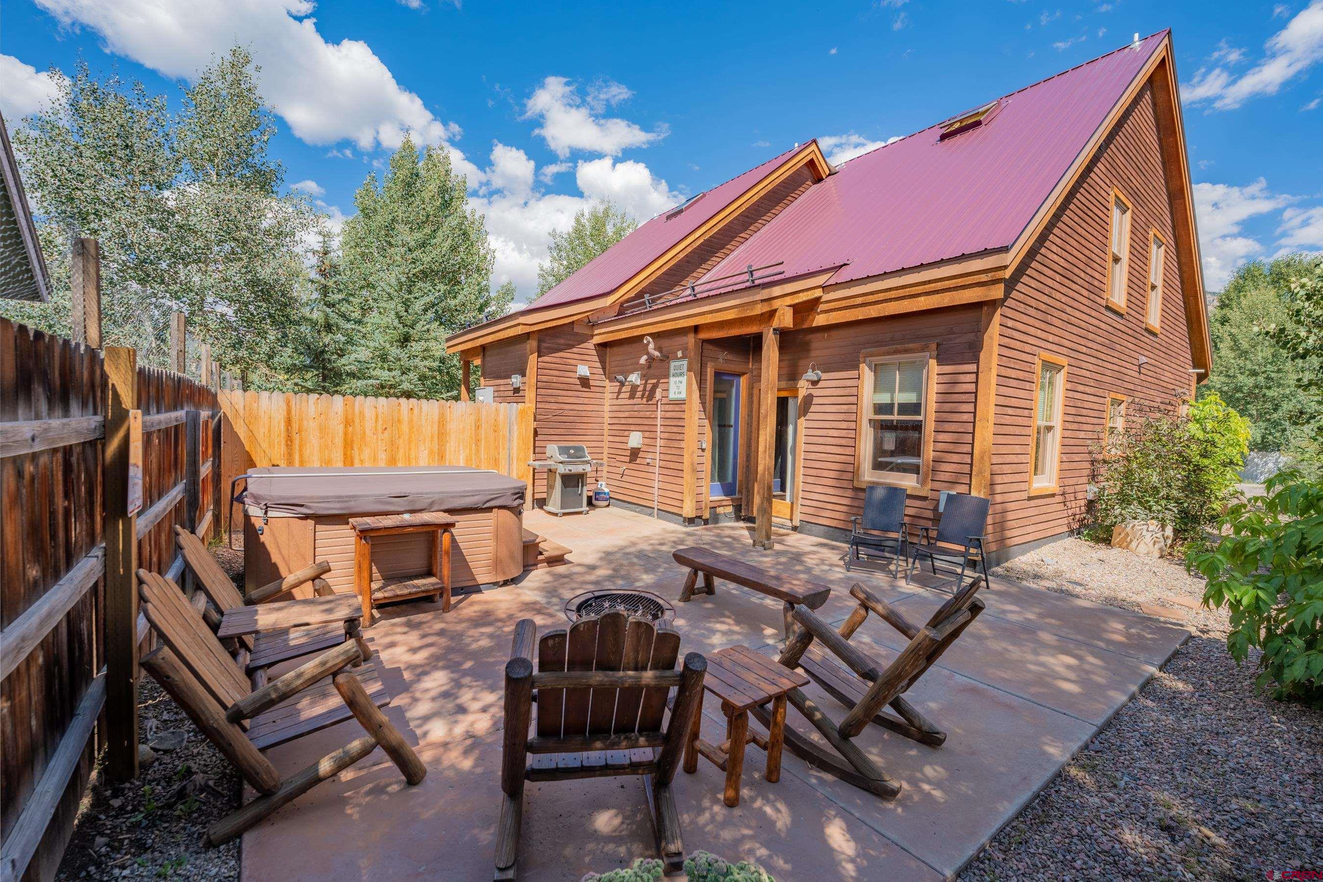 13 7th Street Crested Butte, CO 81224 - Photo 30 of 35 a view of a chair and table in the patio