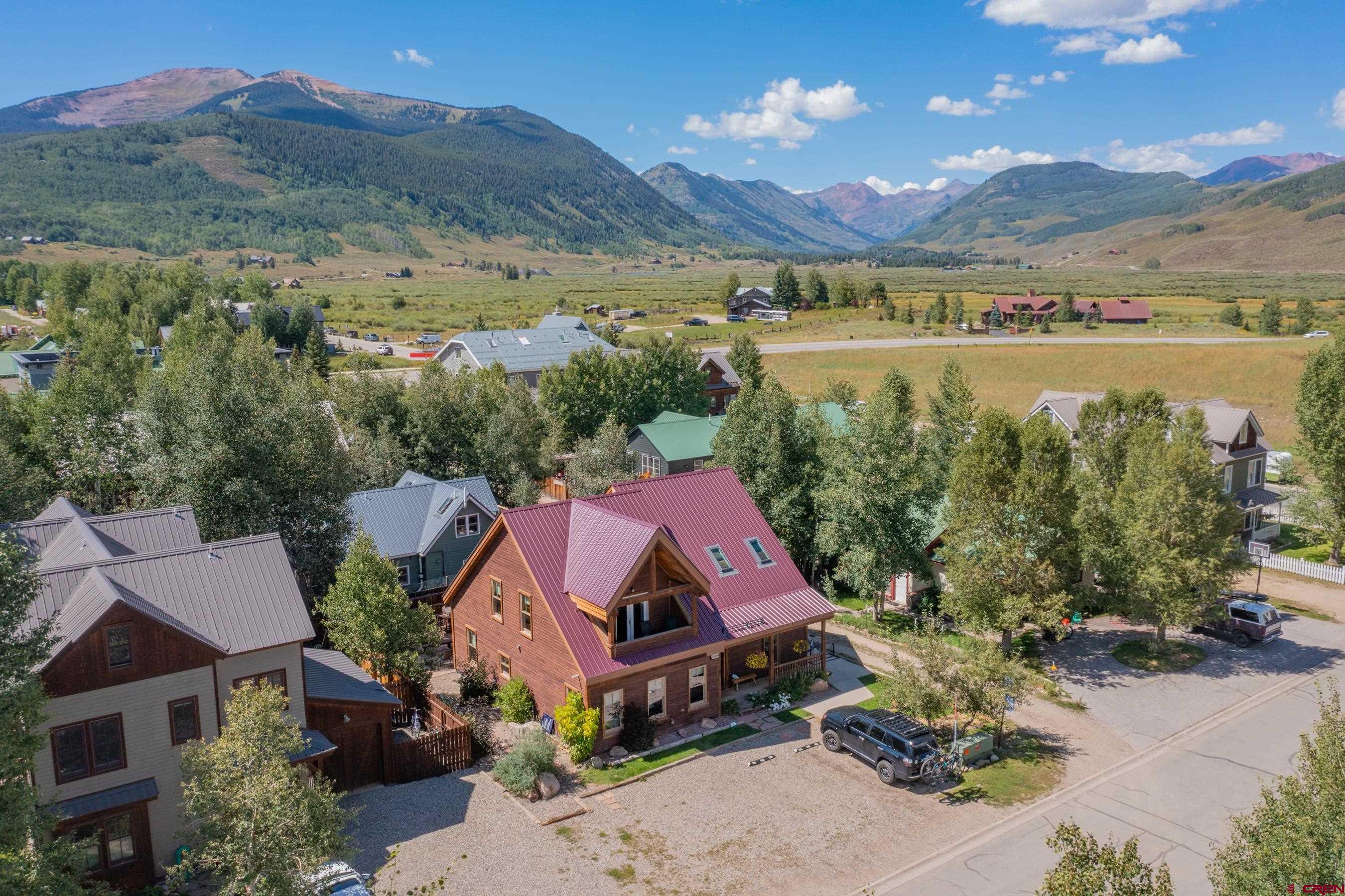 13 7th Street Crested Butte, CO 81224 - Photo 34 of 35 an aerial view of houses with a lake