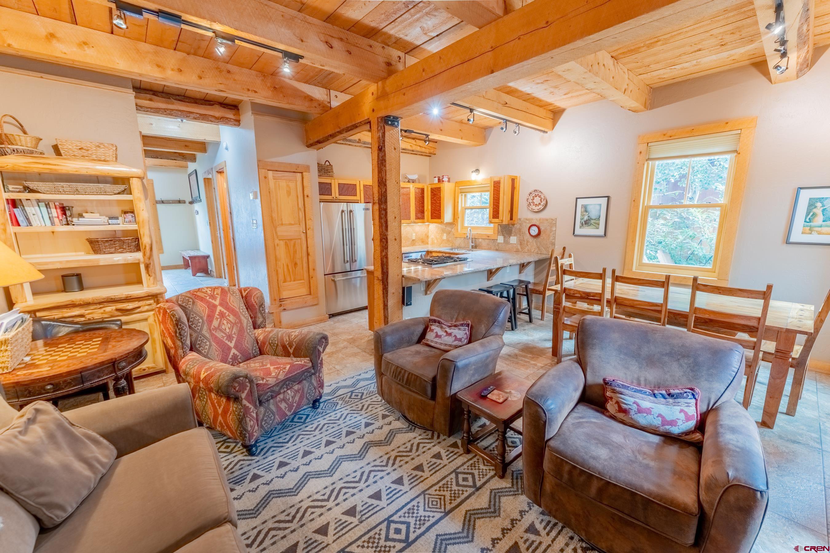 13 7th Street Crested Butte, CO 81224 - Photo 4 of 35 a living room with furniture and a large window