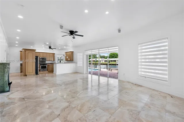 a view of a kitchen with furniture and a fireplace