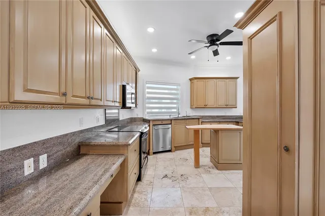 a bathroom with a shower sink and mirror