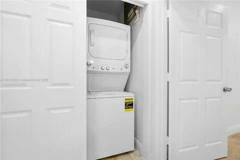 a view of a swimming pool with a lounge chair