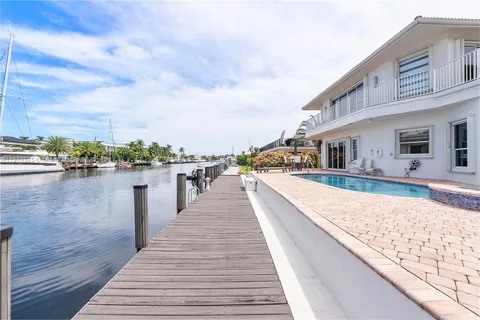 a view of a potted plant in front of a house
