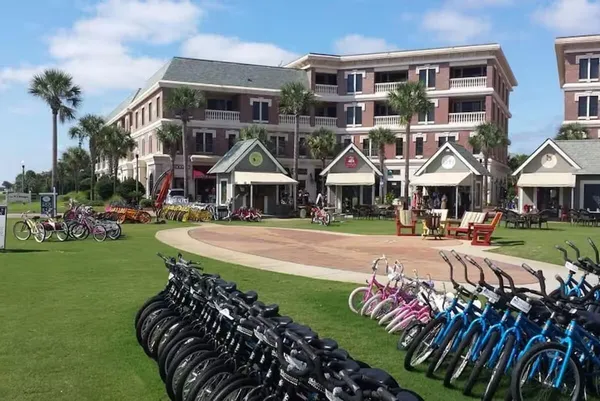 a front view of house and yard with green space