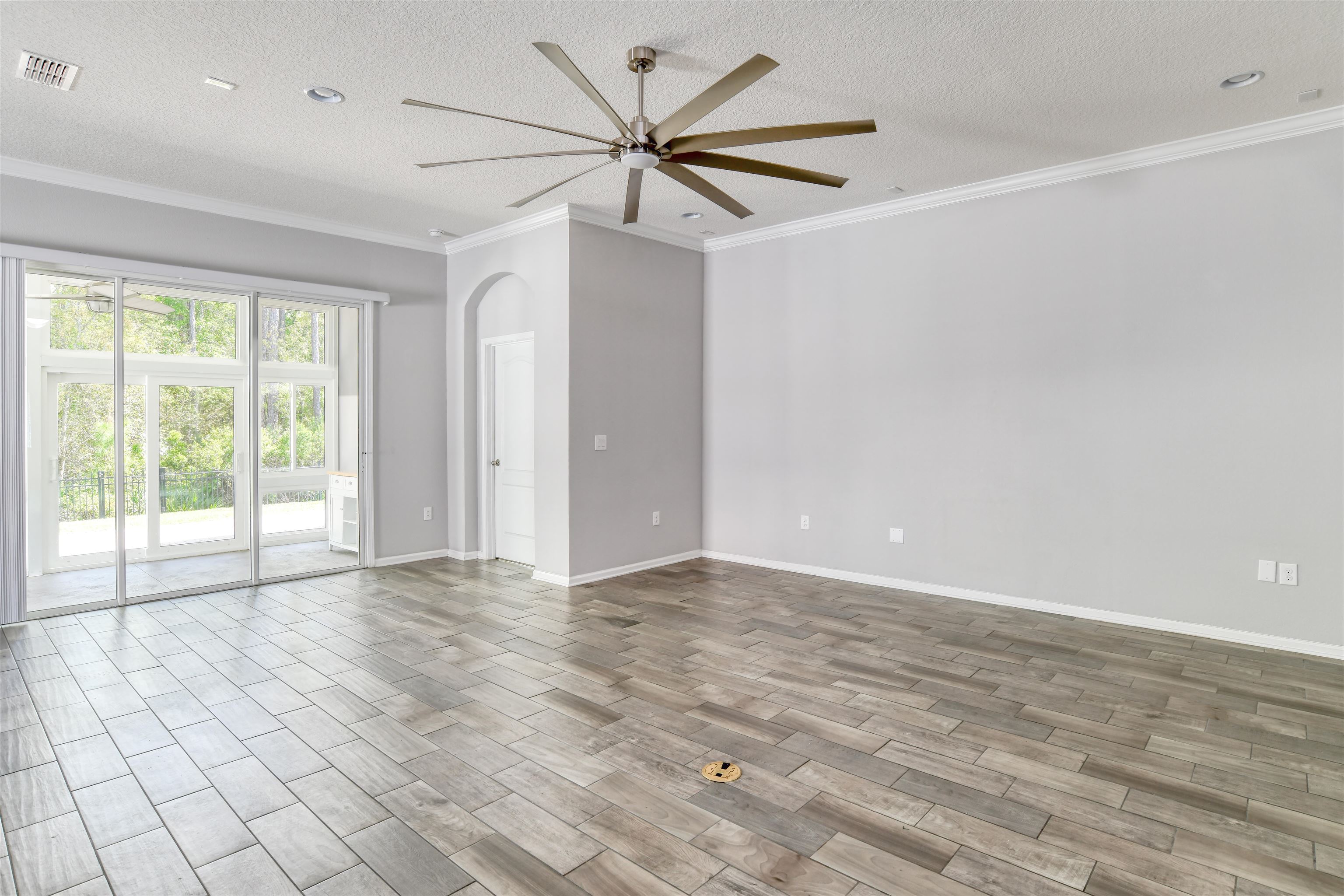 485 Crescent Key Drive St. Augustine, FL 32086 - Photo 14 of 46 a view of an empty room with a window