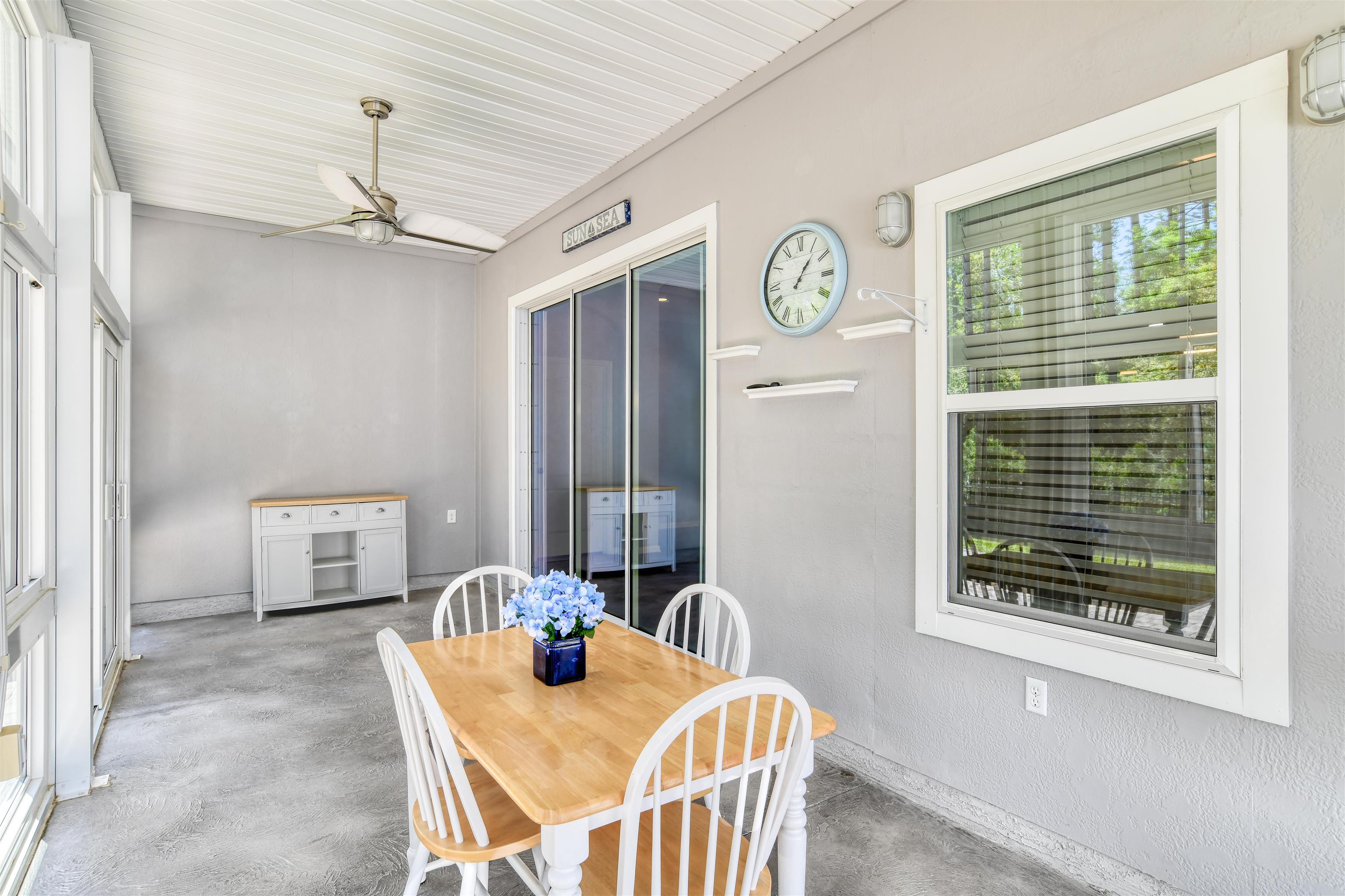 485 Crescent Key Drive St. Augustine, FL 32086 - Photo 19 of 46 a dining room with furniture and window