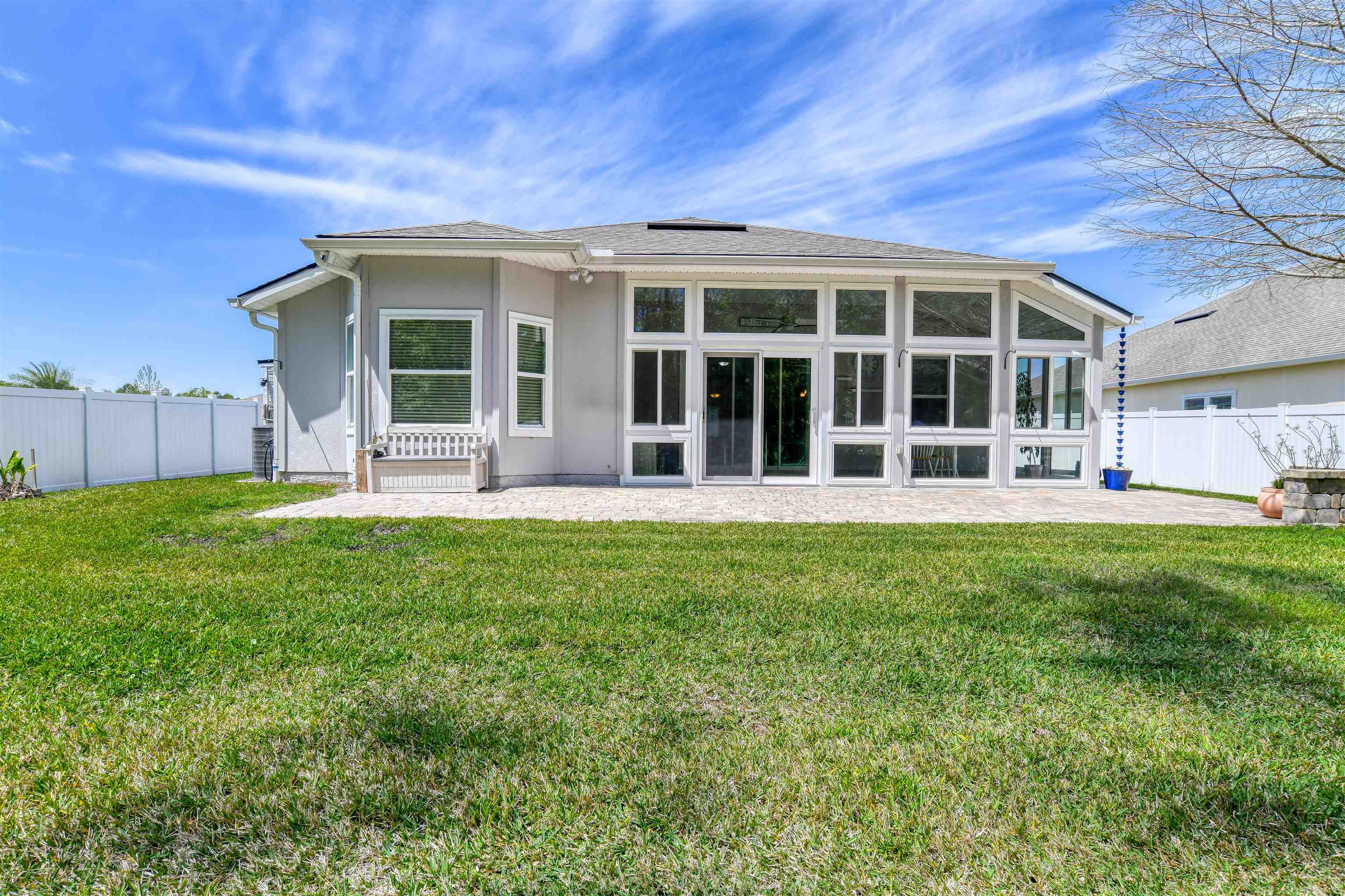 485 Crescent Key Drive St. Augustine, FL 32086 - Photo 21 of 46 front view of a house with a yard