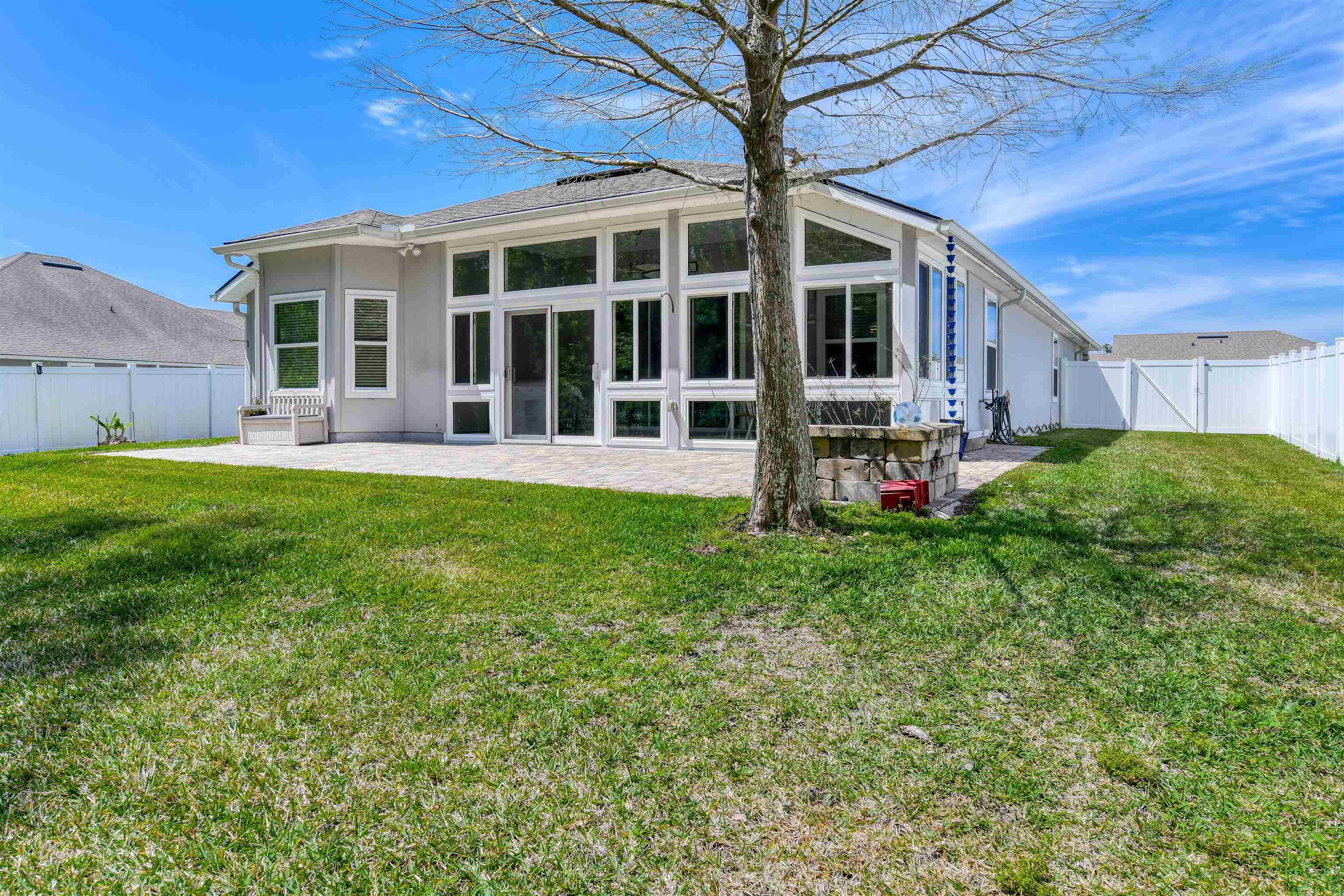 485 Crescent Key Drive St. Augustine, FL 32086 - Photo 22 of 46 front view of a house with a yard