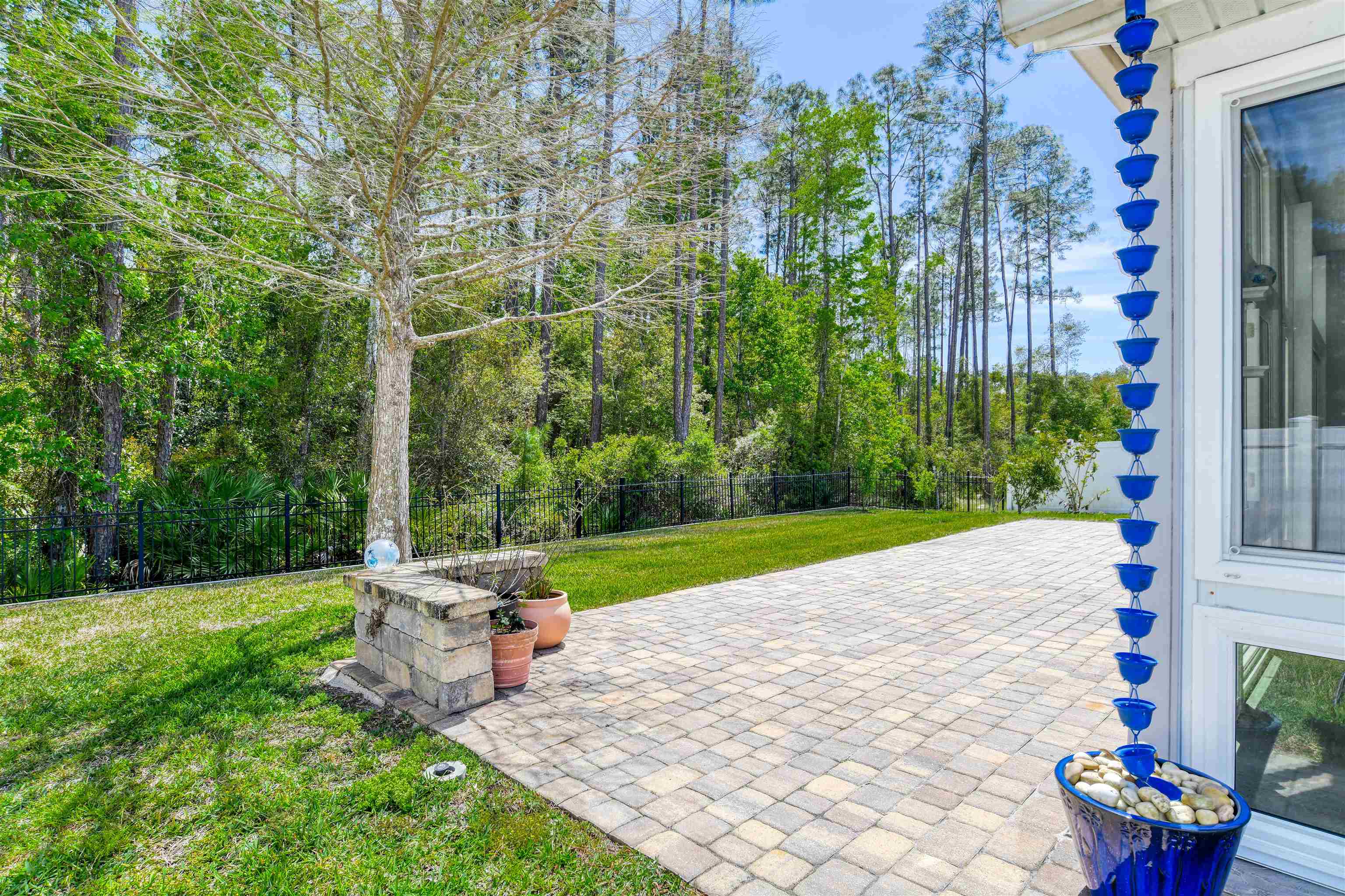 485 Crescent Key Drive St. Augustine, FL 32086 - Photo 24 of 46 a view of a backyard with sitting area