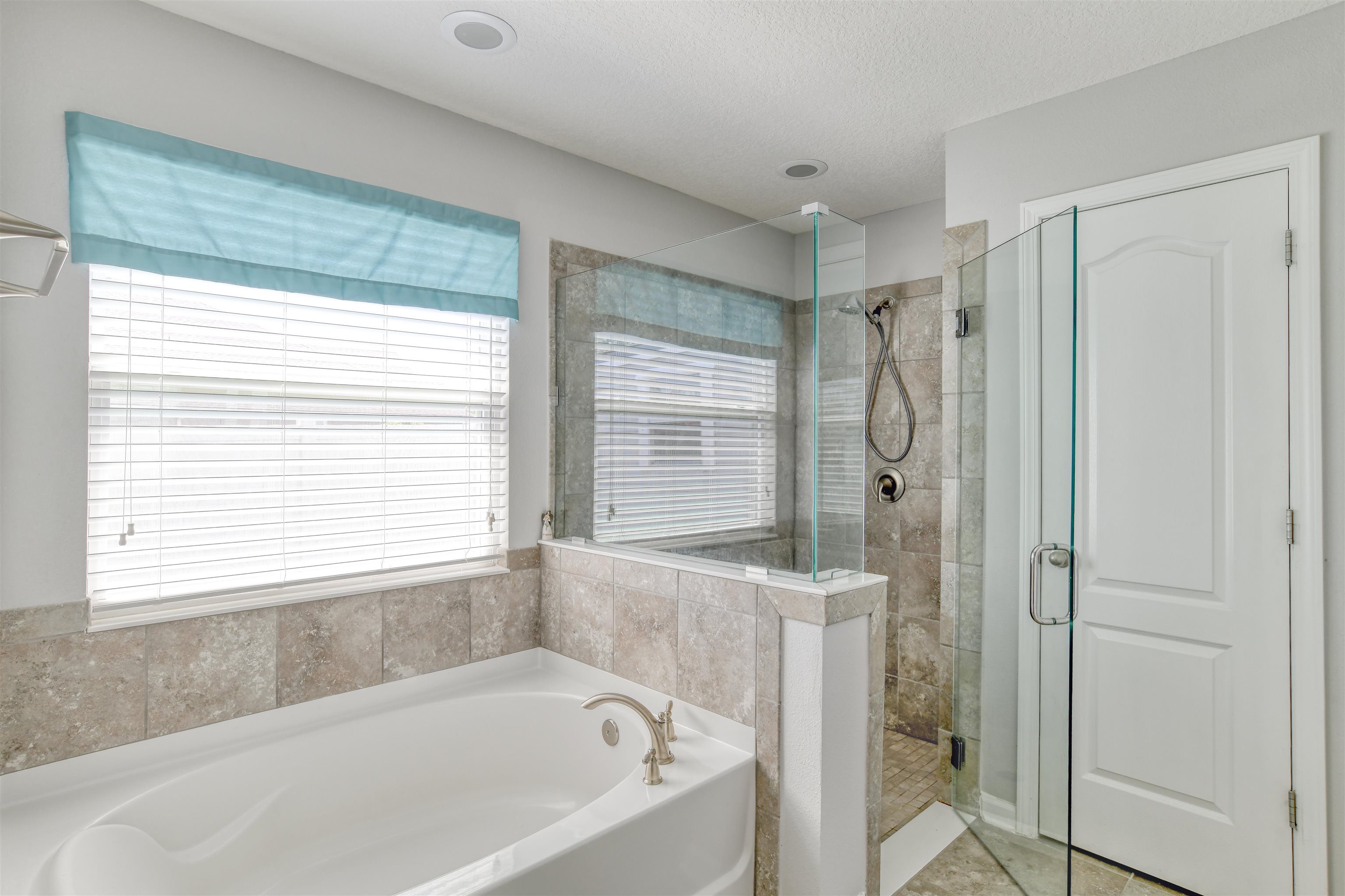 485 Crescent Key Drive St. Augustine, FL 32086 - Photo 26 of 46 a white bath tub sitting next to a window