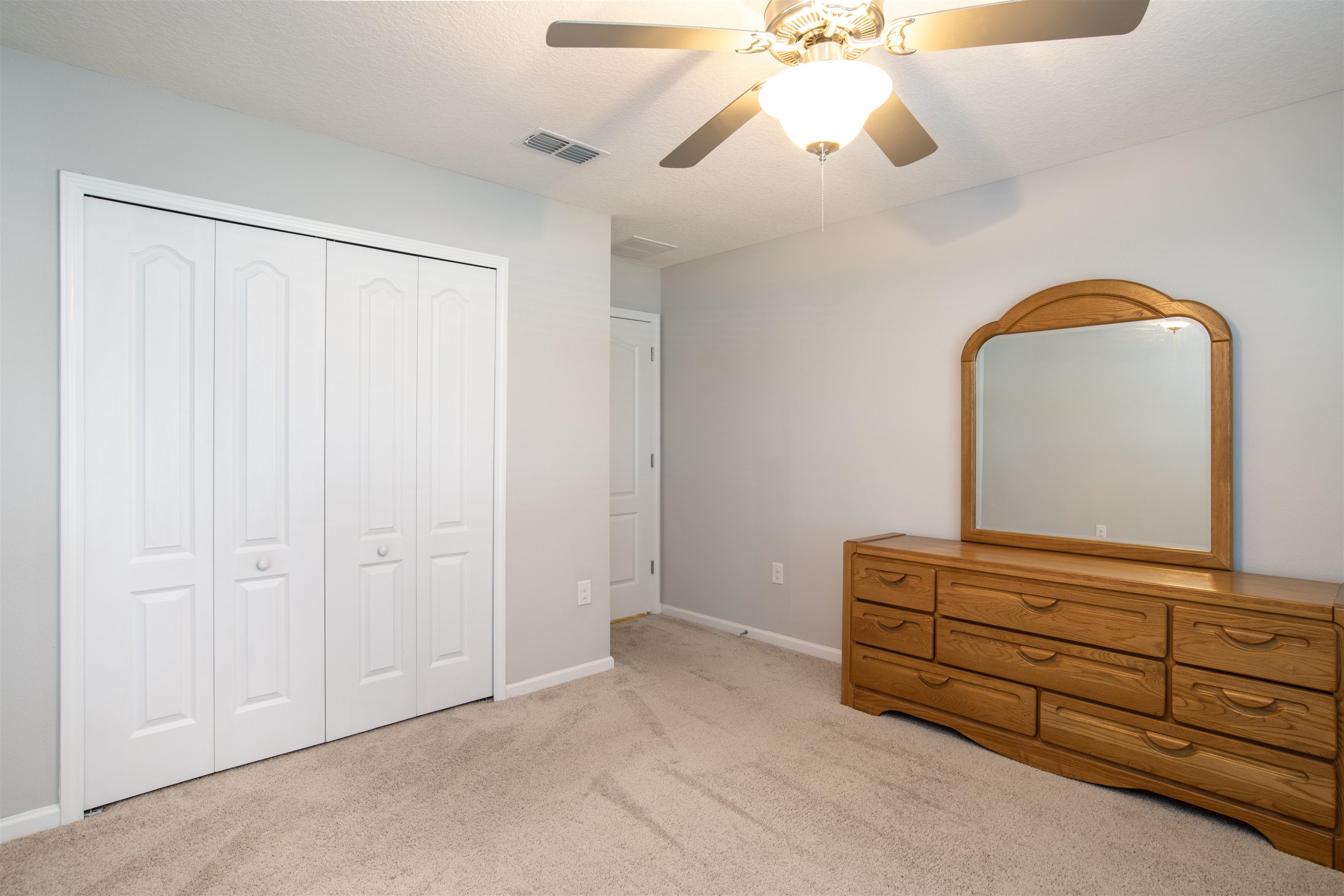 485 Crescent Key Drive St. Augustine, FL 32086 - Photo 33 of 46 a view of room with cabinets and wooden floor