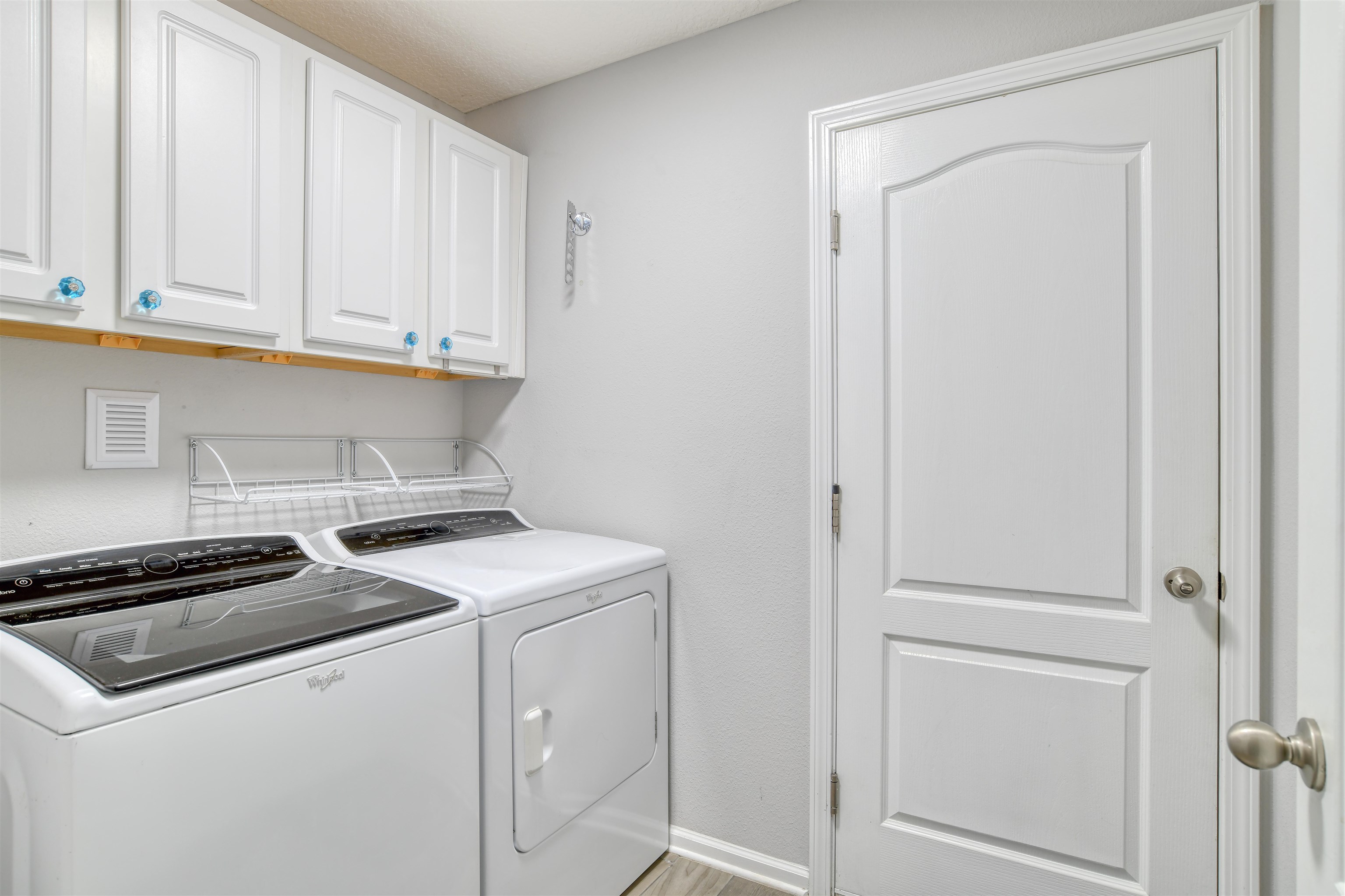 485 Crescent Key Drive St. Augustine, FL 32086 - Photo 36 of 46 a utility room with dryer and washer