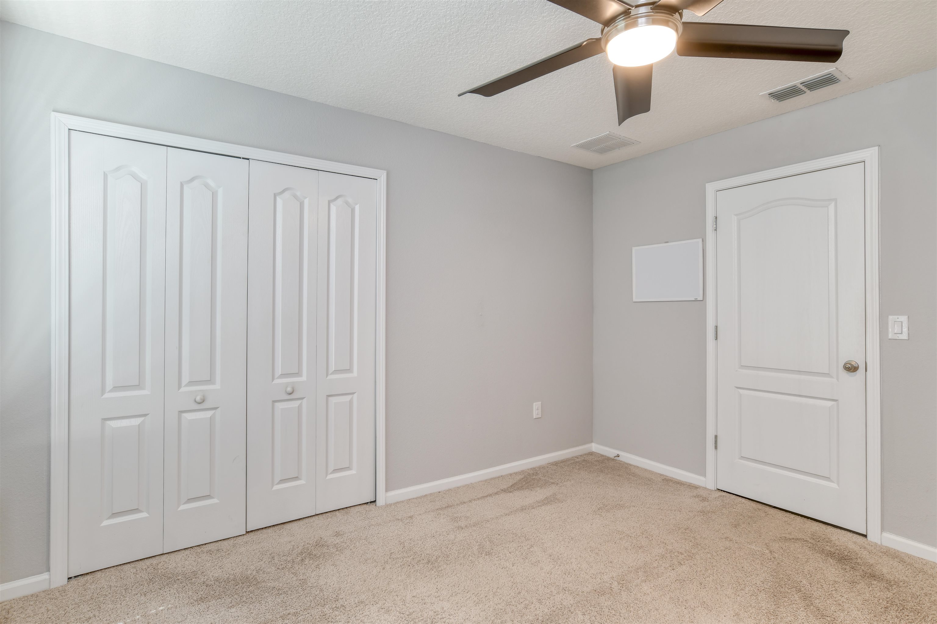 485 Crescent Key Drive St. Augustine, FL 32086 - Photo 37 of 46 an empty room with fan