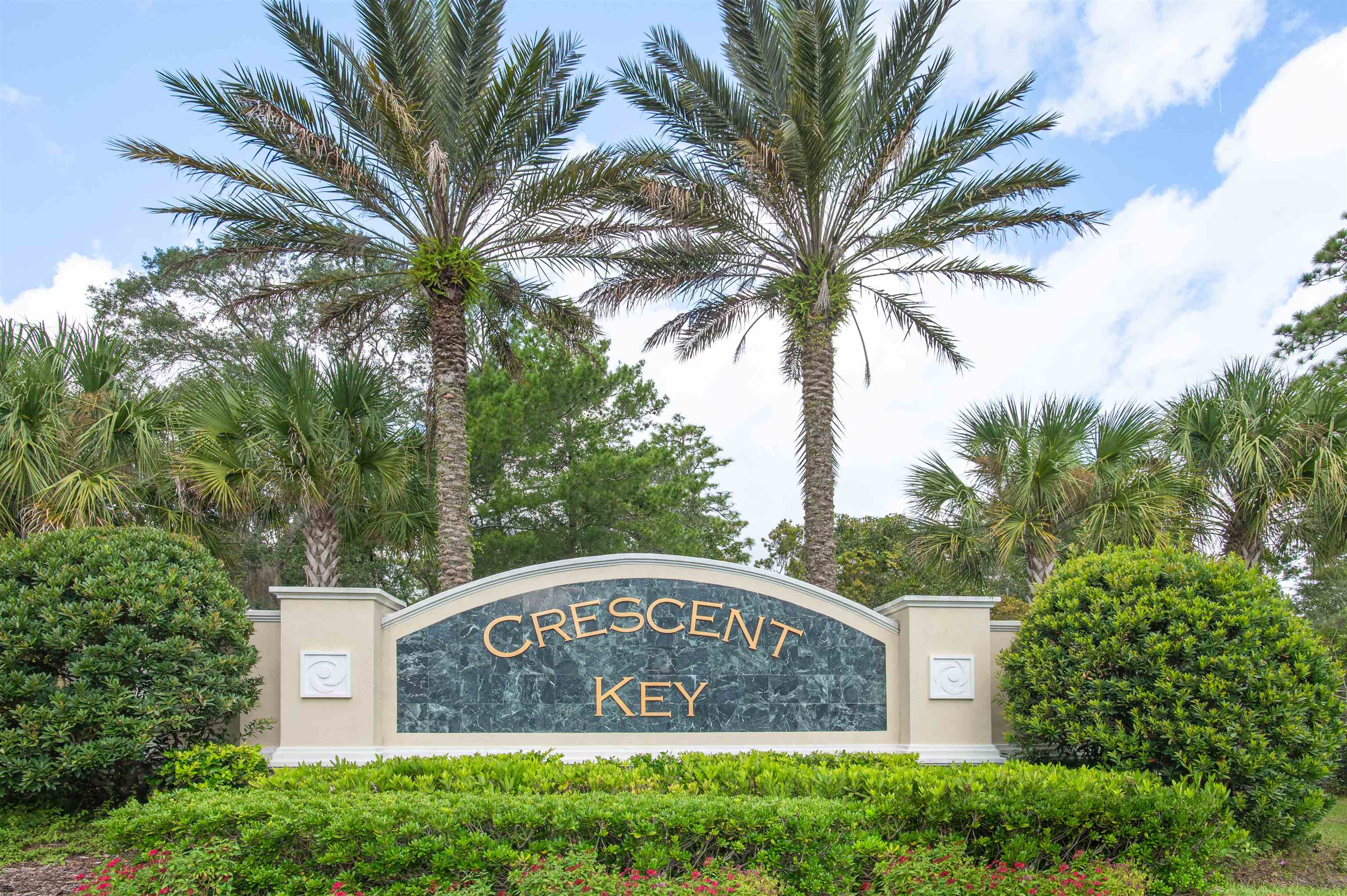 485 Crescent Key Drive St. Augustine, FL 32086 - Photo 41 of 46 a sign on the side of a building