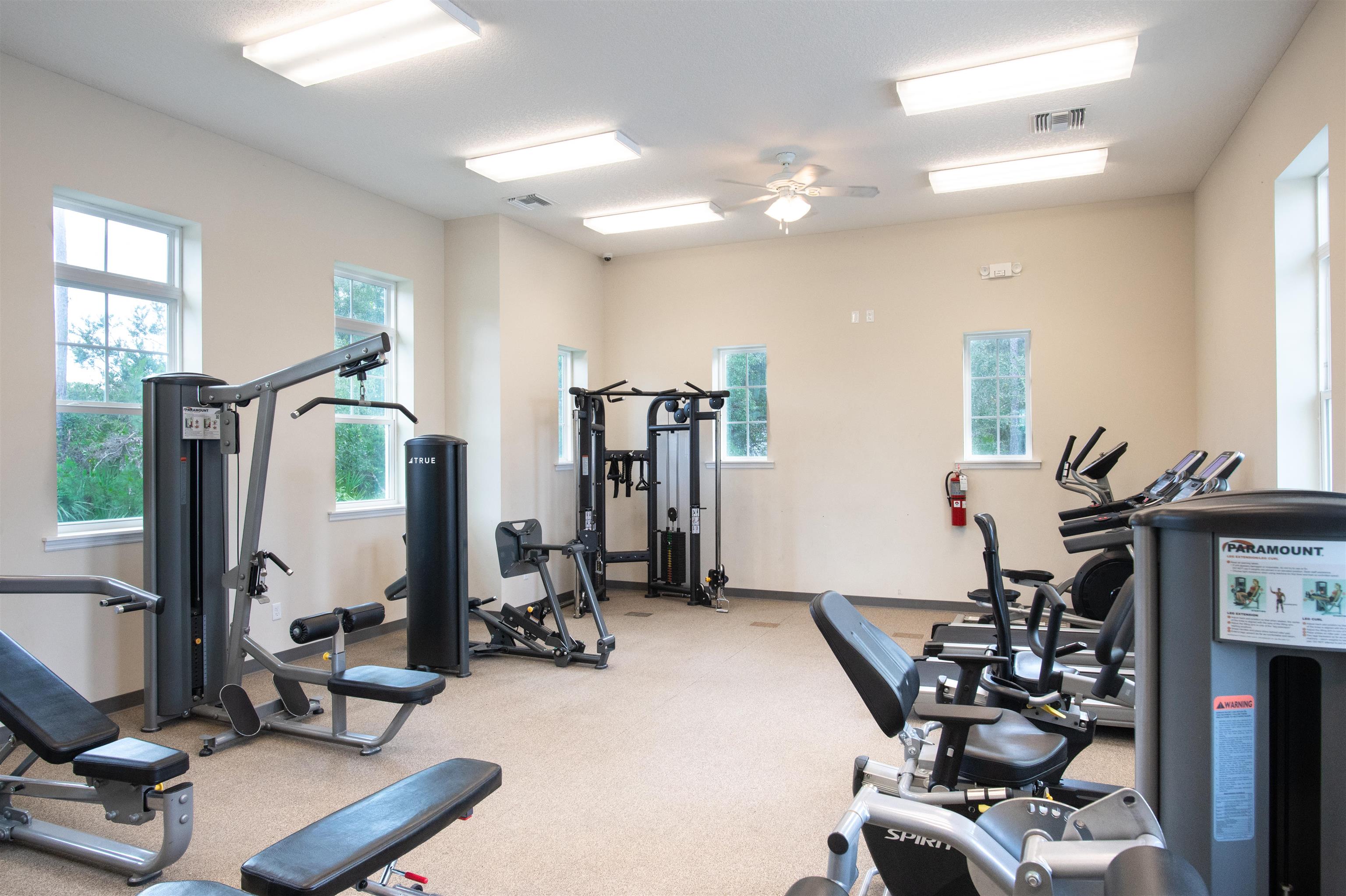 485 Crescent Key Drive St. Augustine, FL 32086 - Photo 46 of 46 a room with gym equipment and a large window