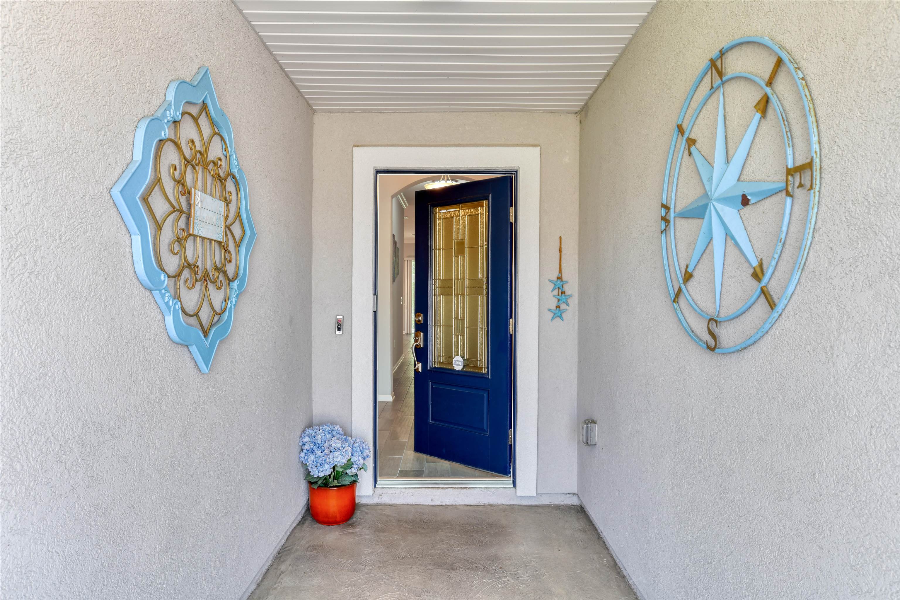 485 Crescent Key Drive St. Augustine, FL 32086 - Photo 6 of 46 a view of a hallway with entryway to front door