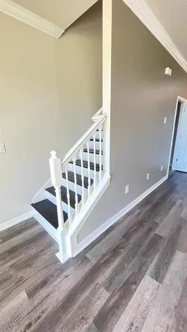 a view of a balcony with staircase