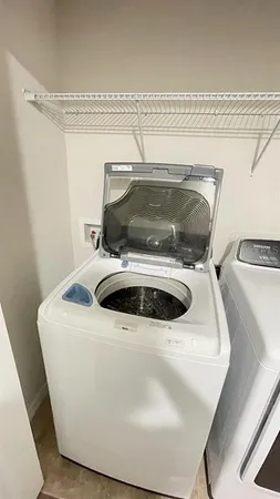 a utility room with a washer and dryer