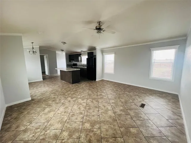 a view of a kitchen with a sink appliances and cabinets