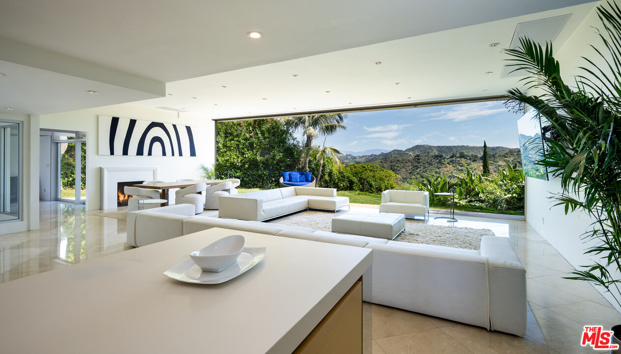 1466 Bel Air Road Los Angeles, CA 90077 - Photo 20 of 35 a living room with furniture and a large window