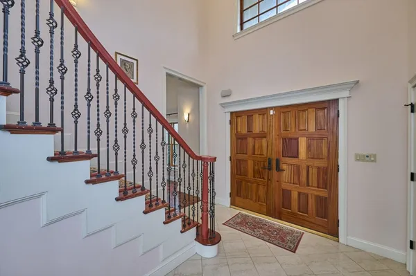 a view of an entryway with stairs