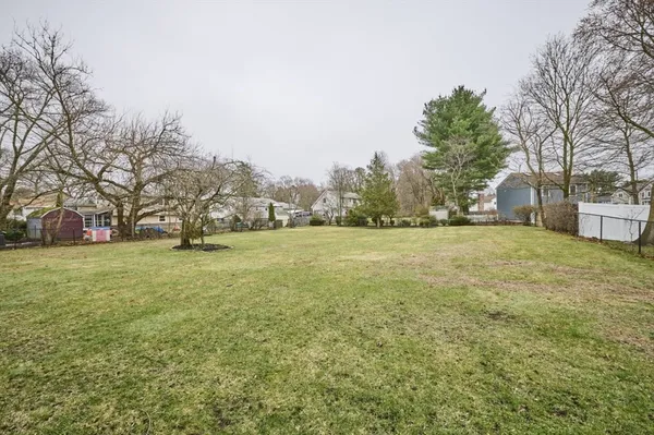 a view of yard with trees
