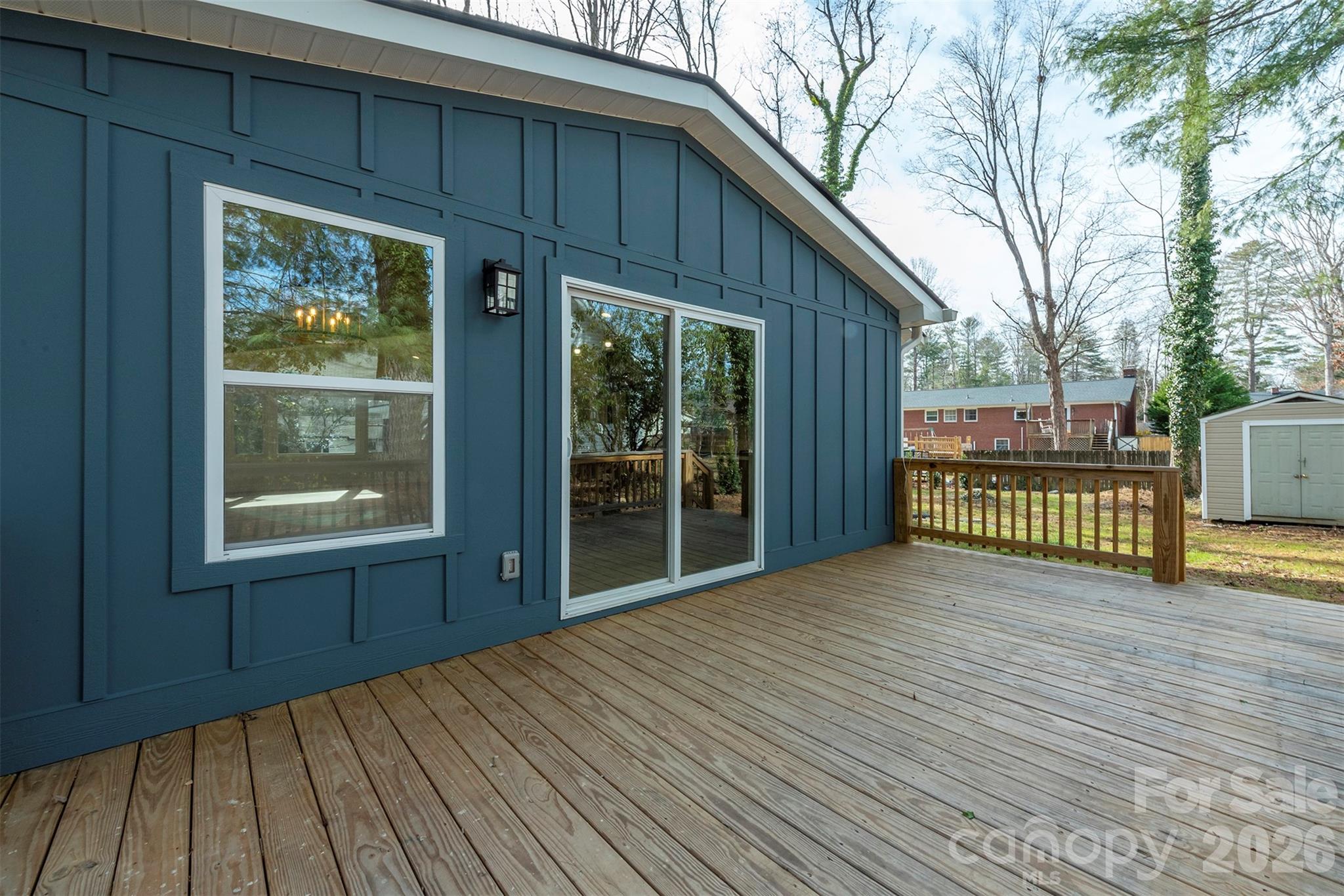 524 Pineland Road Hendersonville, NC 28792 - Photo 17 of 36 a view of a house with a porch