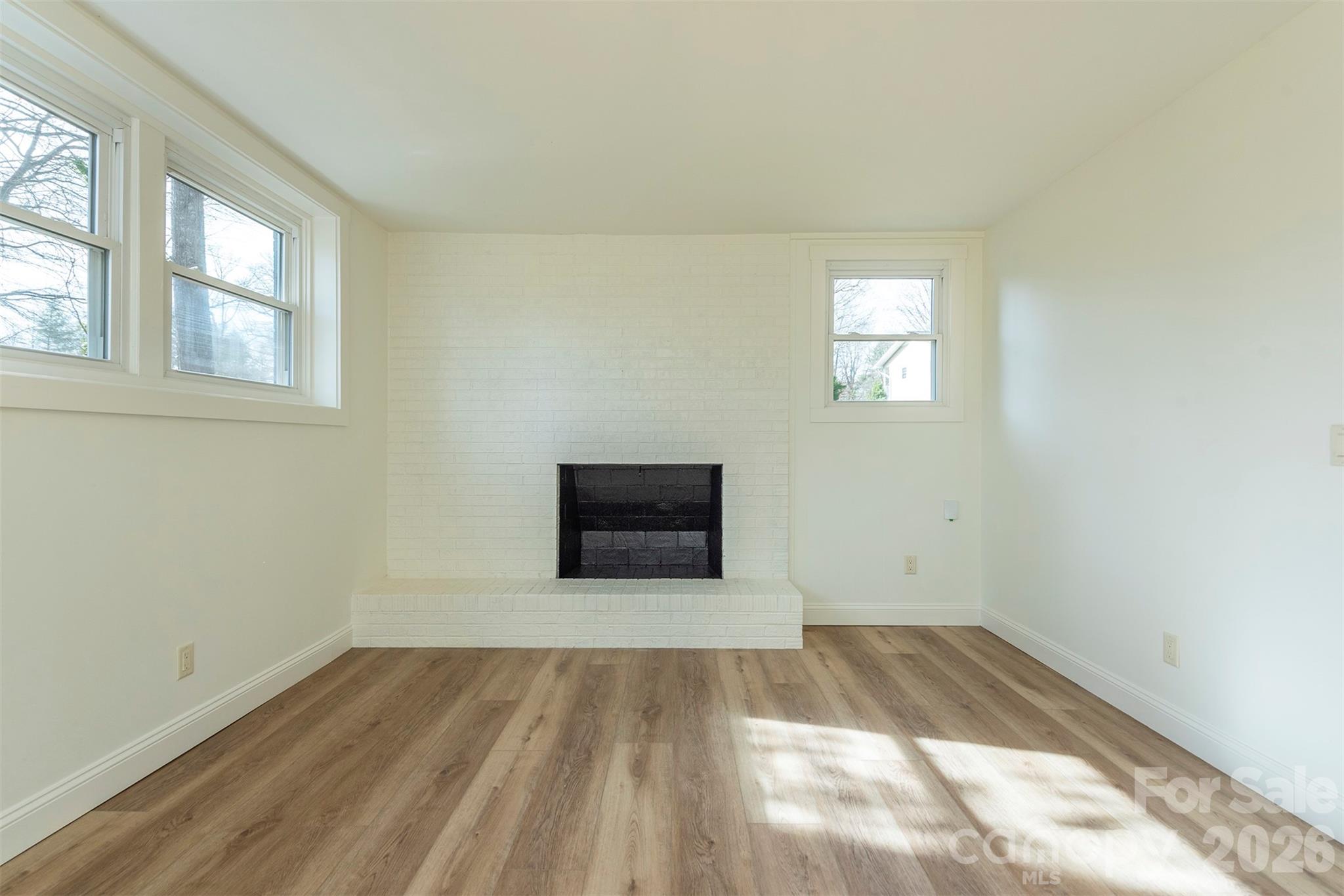 524 Pineland Road Hendersonville, NC 28792 - Photo 26 of 36 an empty room with a window