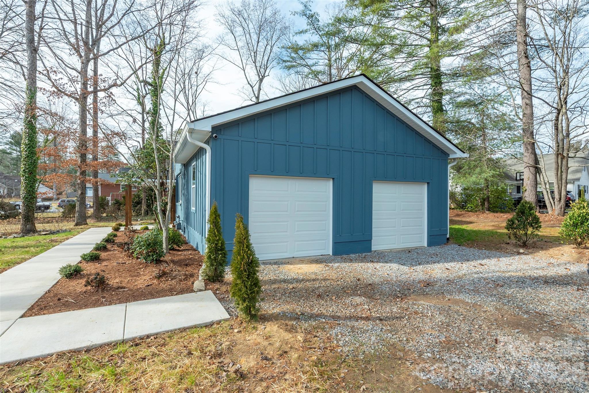 524 Pineland Road Hendersonville, NC 28792 - Photo 35 of 36 a view of a house with a yard and large tree