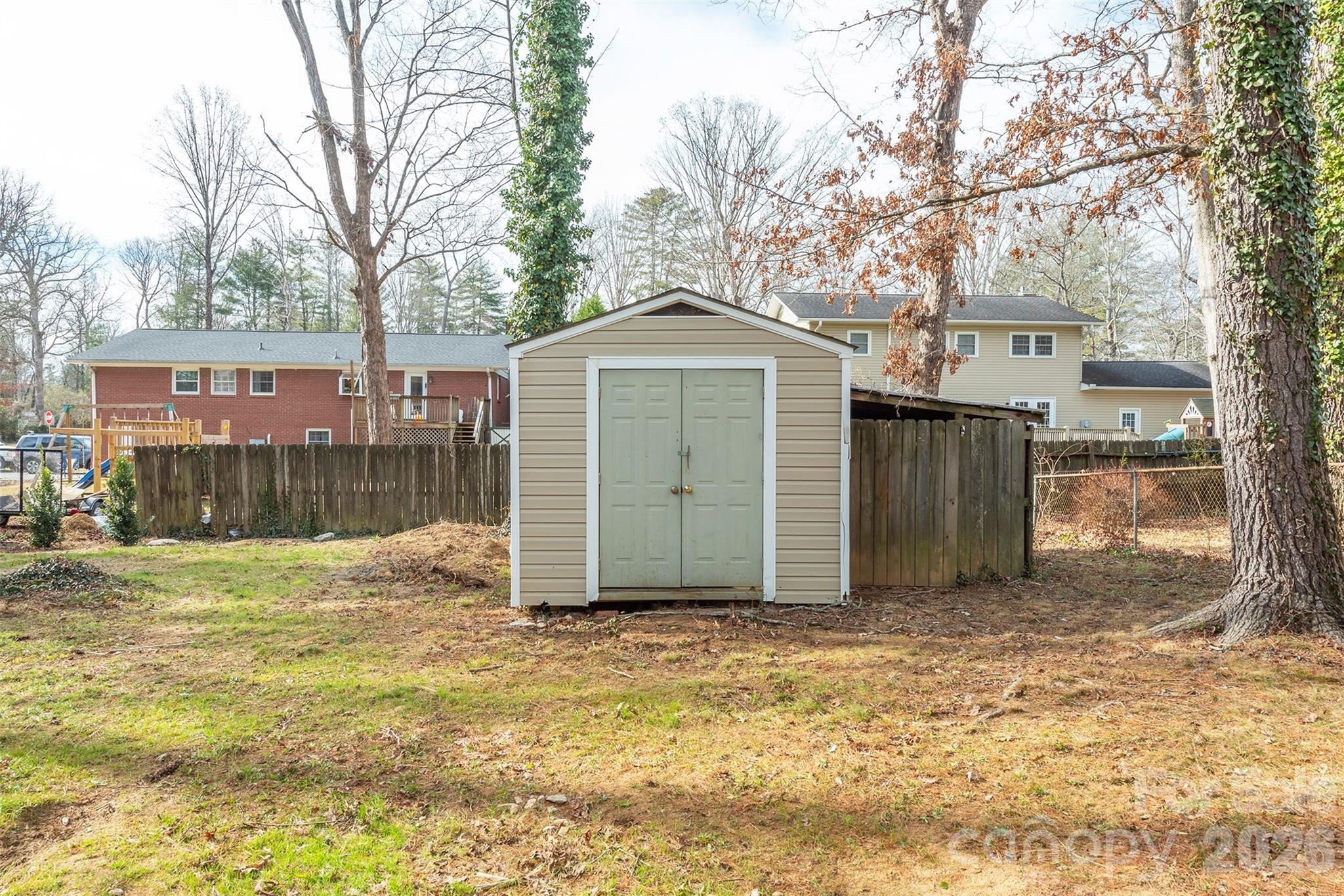 524 Pineland Road Hendersonville, NC 28792 - Photo 36 of 36 a view of a small yard in front of a house