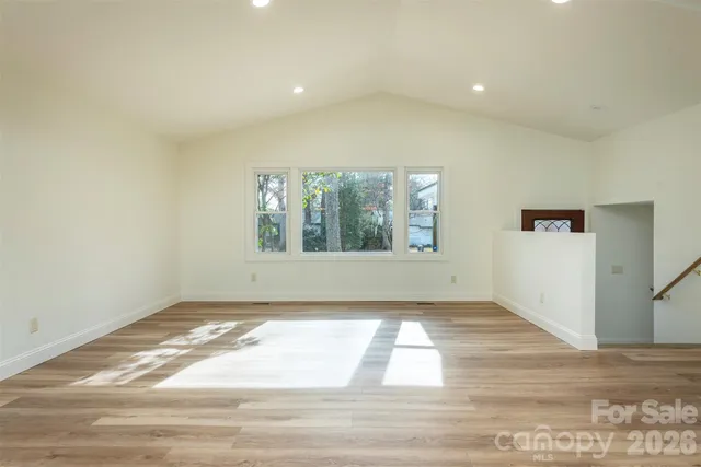 a view of an empty room and window