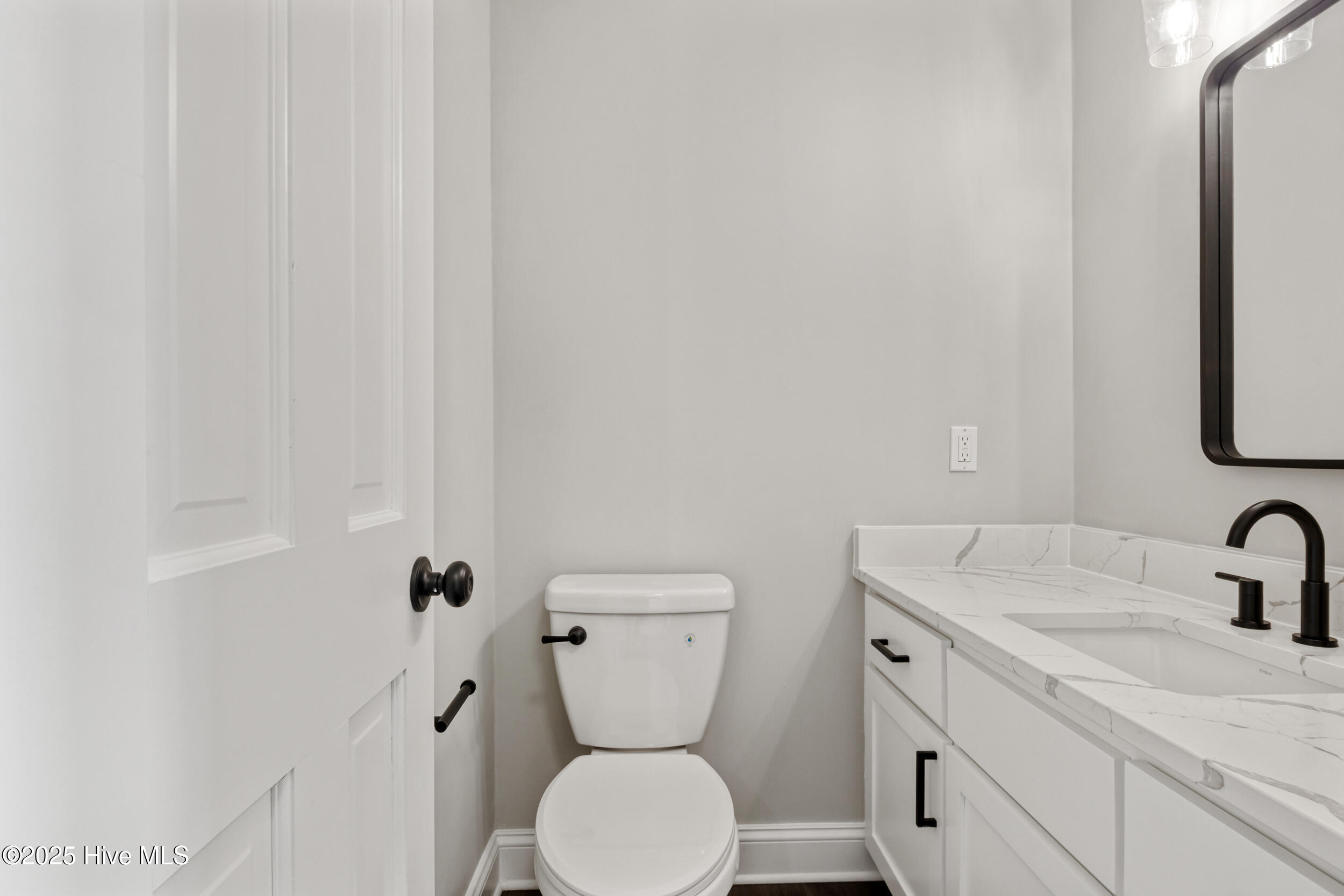 169 Baxter Estates Road Currituck, NC 27929 - Photo 20 of 39 1st floor half bathroom
