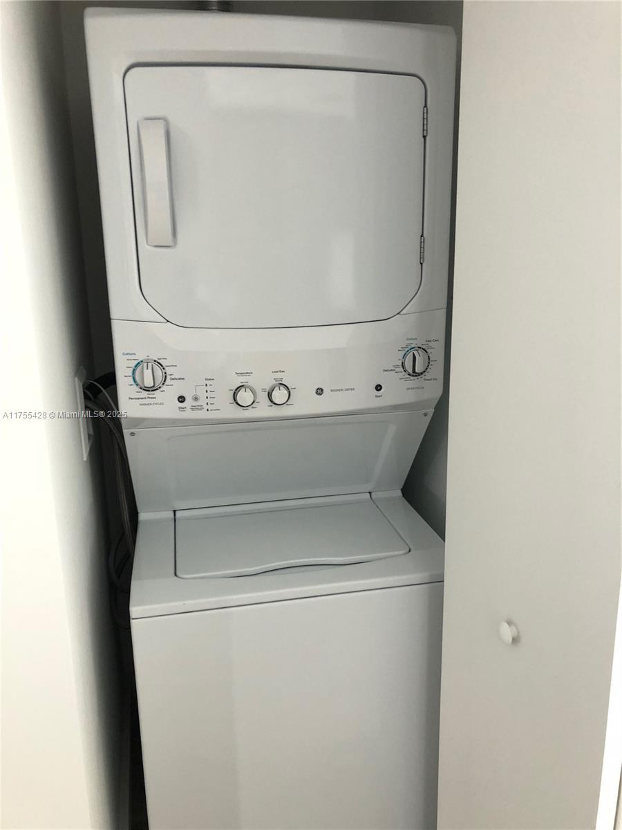 650 Northeast 32nd Street, Unit 2006 Miami, FL 33137 - Photo 9 of 15 a close up view of a washer and dryer