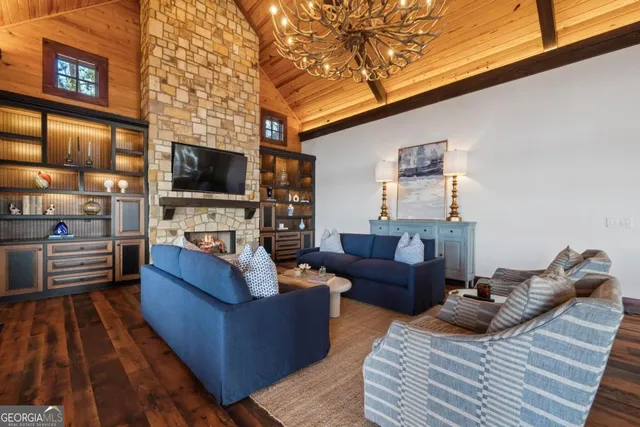 a view of a patio with table and chairs