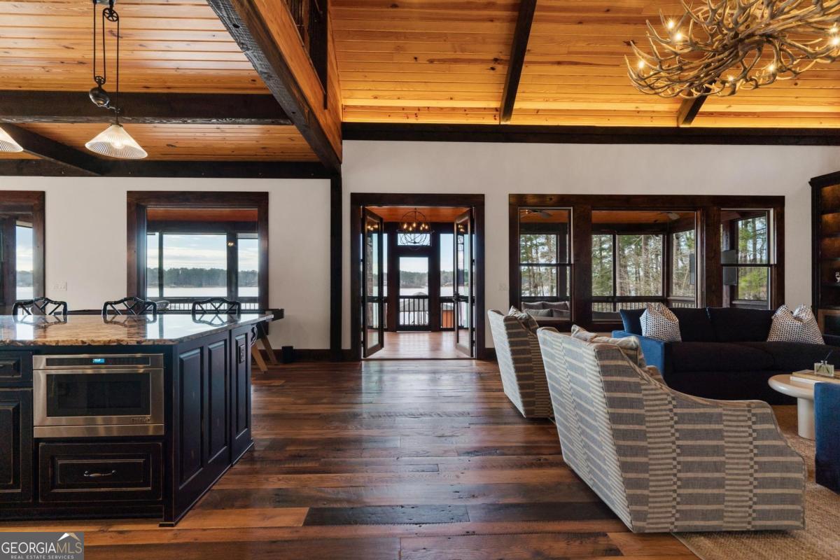 4096 Big Water E Road Sparta, GA 31087 - Photo 24 of 70 a view of a living room and dining room with furniture