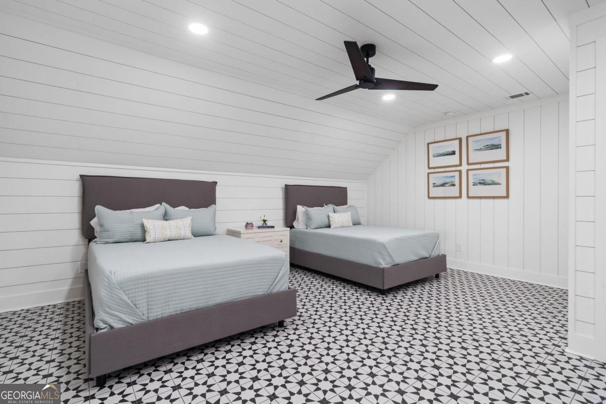 4096 Big Water E Road Sparta, GA 31087 - Photo 44 of 70 a bedroom with a bed and a view of a bathroom