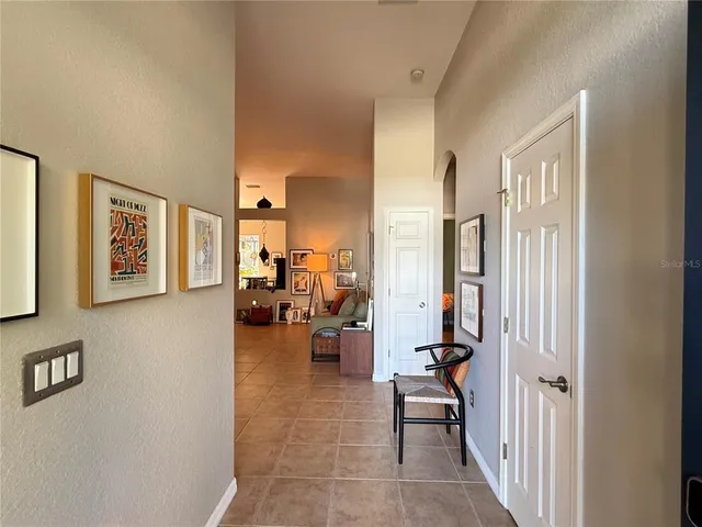 a bathroom with a sink toilet double vanity and shower