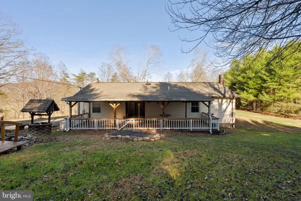 a view of balcony with wooden floor