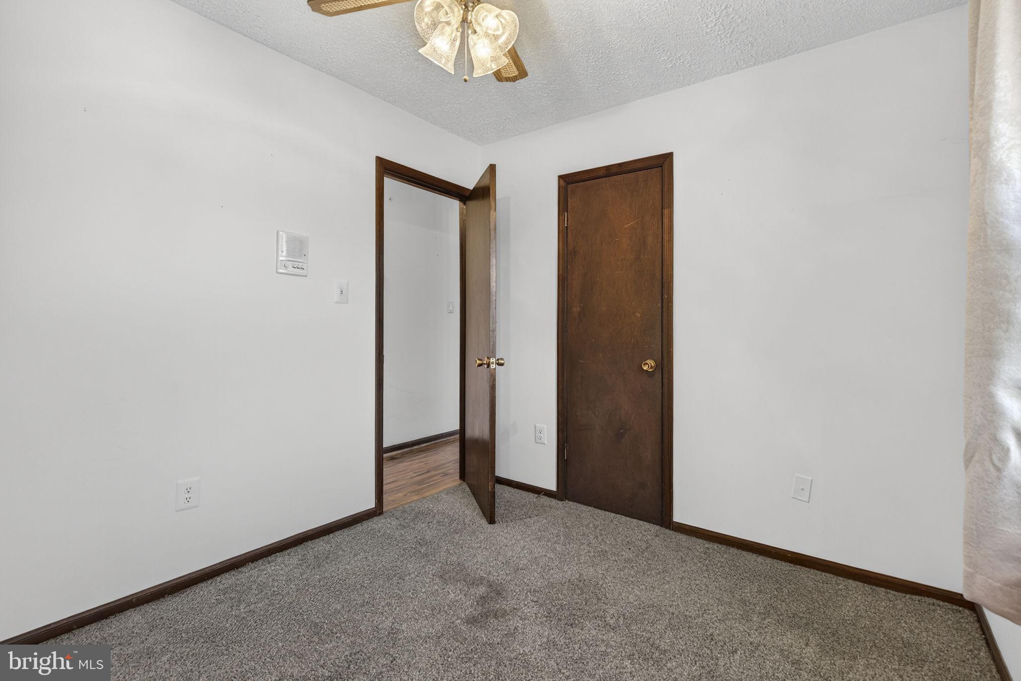 148 Viewtown Road Amissville, VA 20106 - Photo 35 of 56 an empty room with chandelier fan