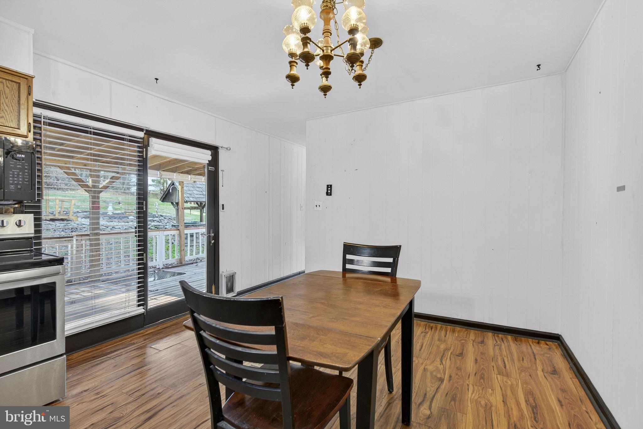 148 Viewtown Road Amissville, VA 20106 - Photo 47 of 56 a view of a dining room with furniture and wooden floor