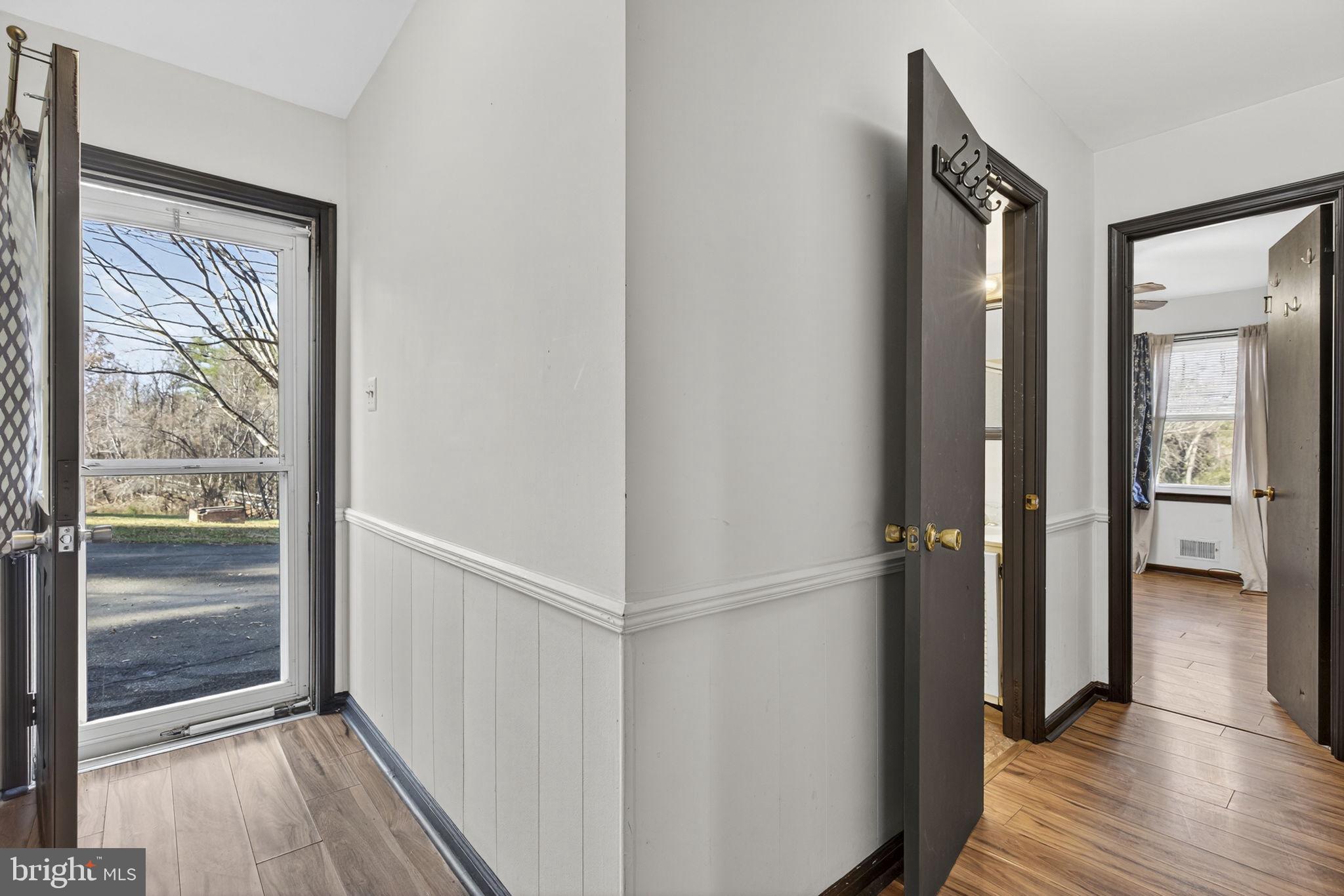 148 Viewtown Road Amissville, VA 20106 - Photo 50 of 56 a view of a hallway with wooden floor and closet