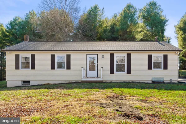 a view of a backyard with a garden