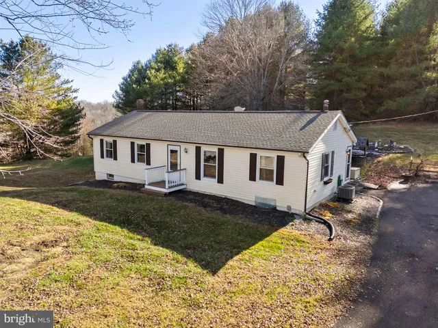 a view of a yard with an outdoor space