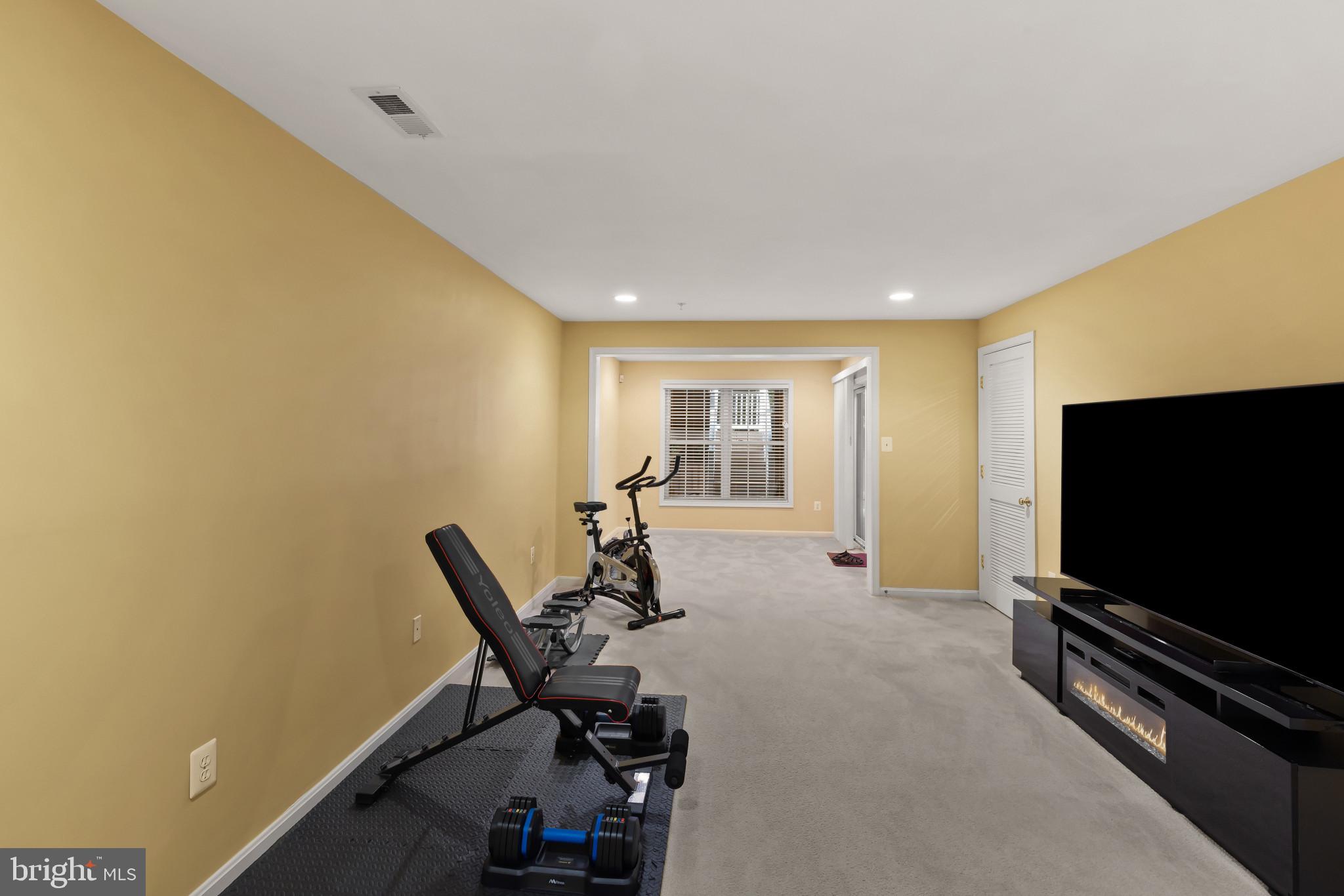 2433 Killarney Terrace Odenton, MD 21113 - Photo 42 of 48 a living room with furniture and a flat screen tv