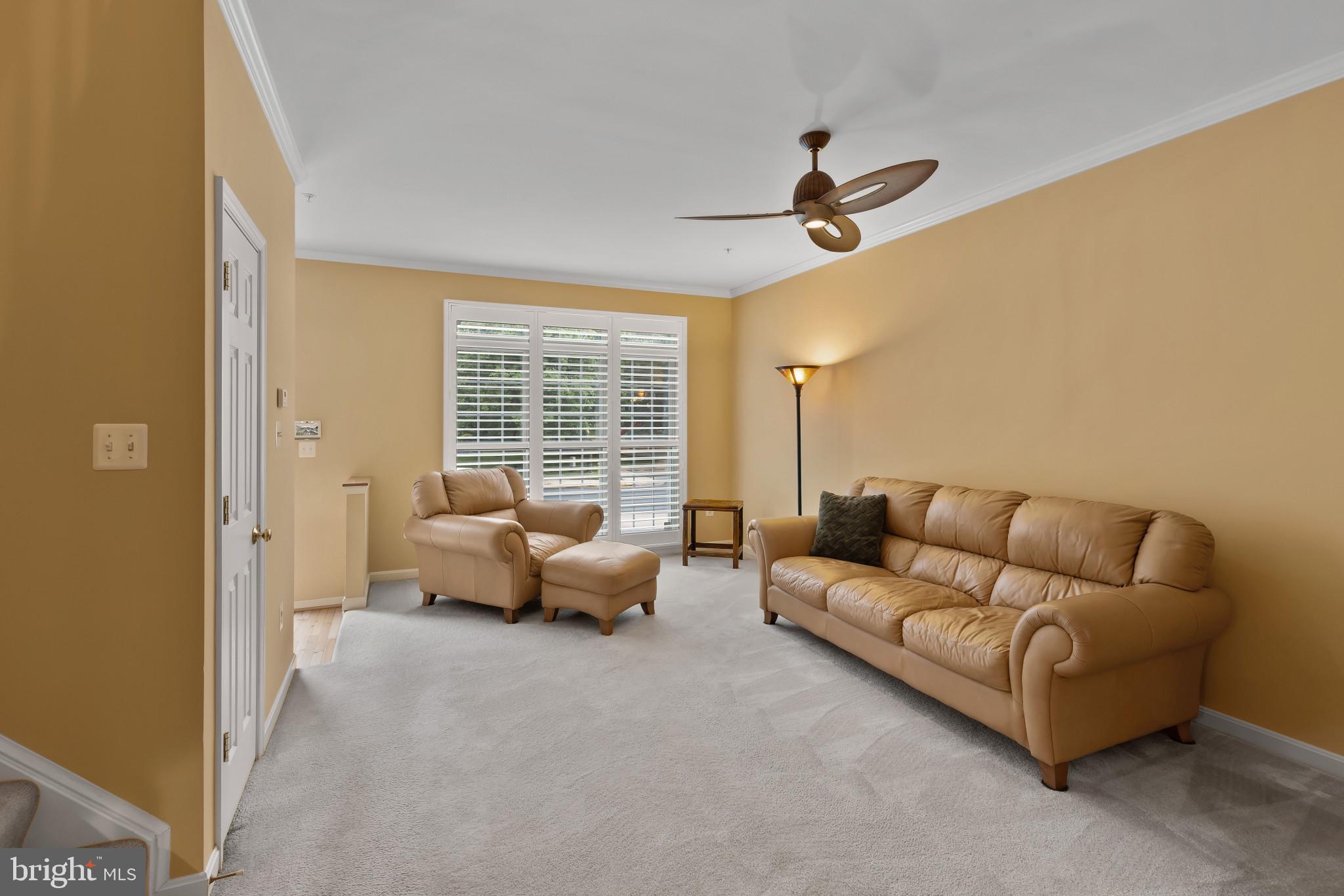 2433 Killarney Terrace Odenton, MD 21113 - Photo 5 of 48 a living room with furniture and a window