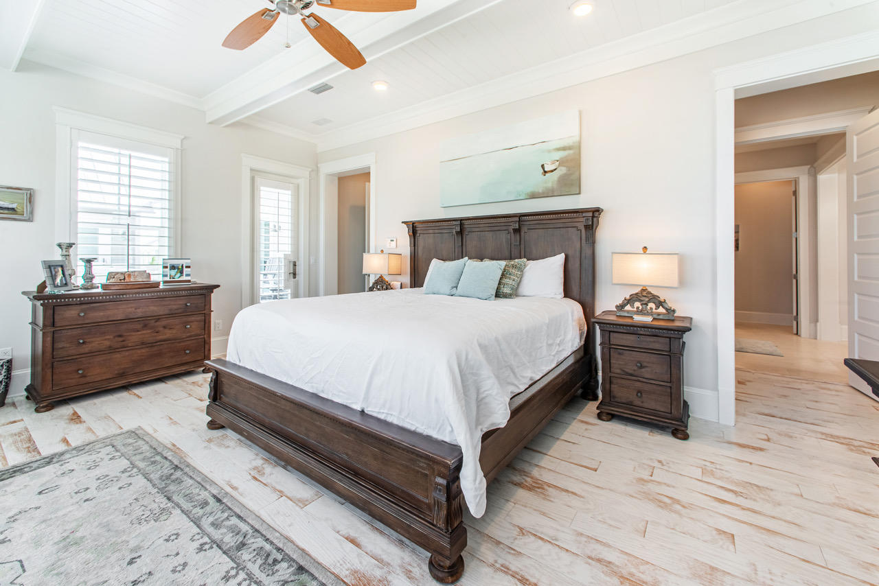9 West Chester St Inlet Beach Inlet Beach, FL 32461 - Photo 17 of 54 a bedroom with a bed and wooden floor