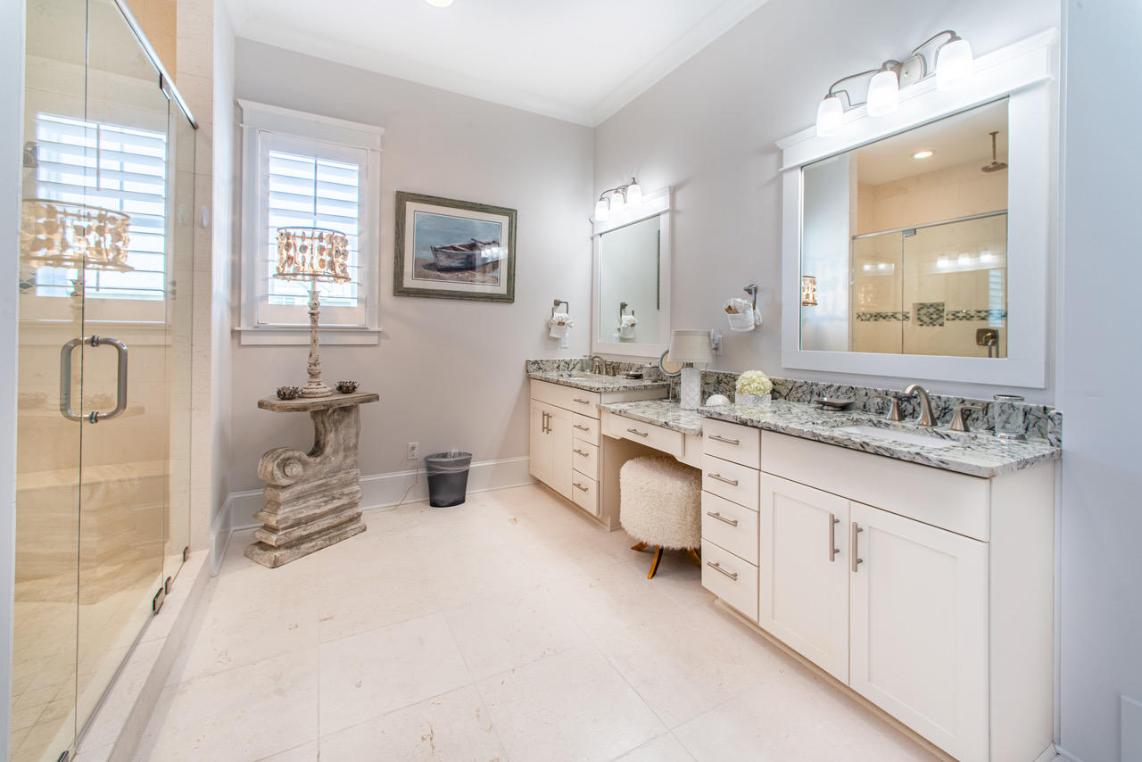 9 West Chester St Inlet Beach Inlet Beach, FL 32461 - Photo 19 of 54 a bathroom with a sink double vanity and a shower