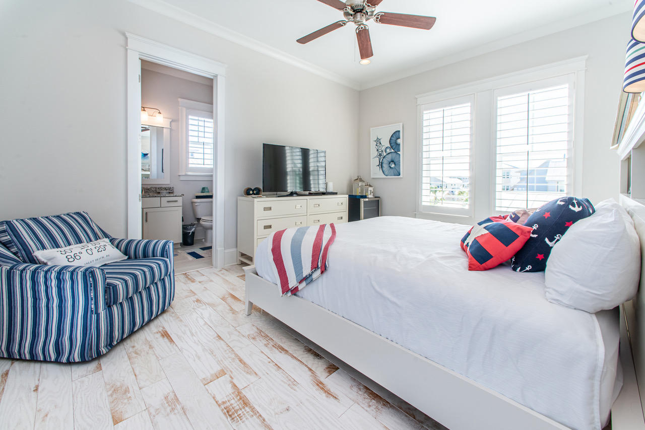 9 West Chester St Inlet Beach Inlet Beach, FL 32461 - Photo 23 of 54 a bedroom with a bed and a flat screen tv